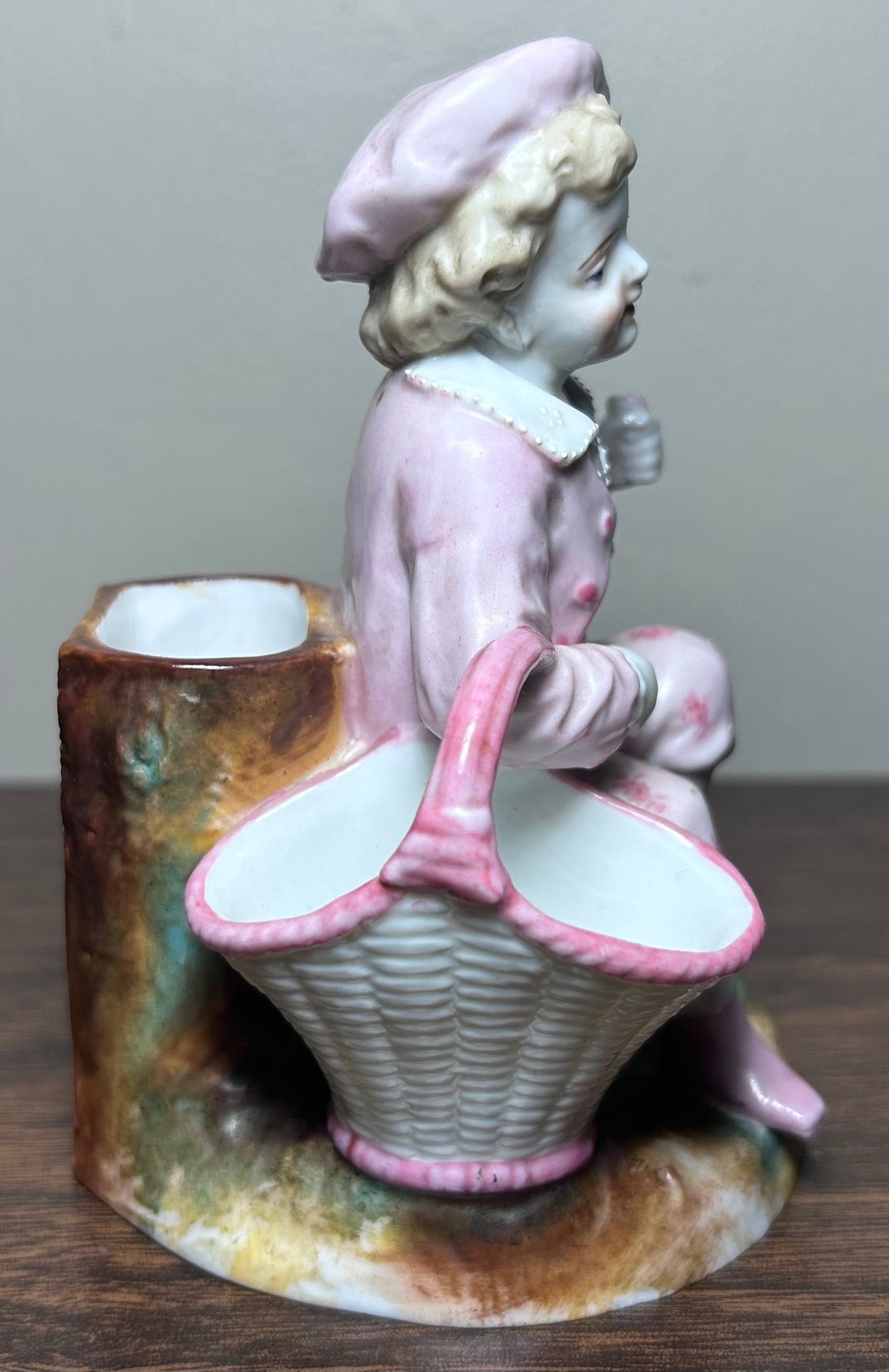 Circa 1870 German Victorian Conta & Boehme Porcelain Young Boy with Flower Basket Figural Matchstick Holder China Fairing