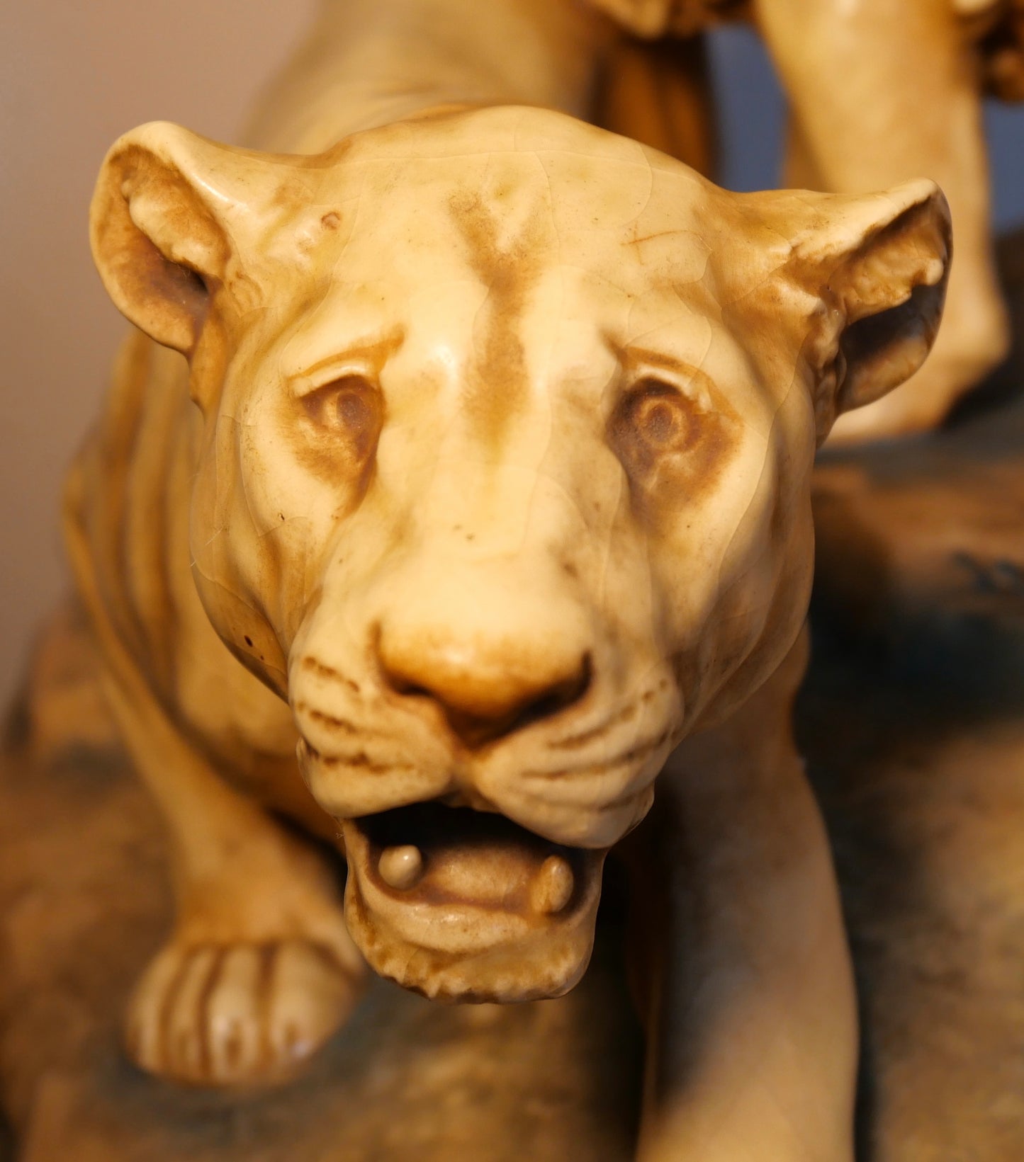 Circa 1900 Austrian Art Nouveau Theodore Schoop for Bernard Bloch Porcelain Lion and Lioness on Rock Figural Group Sculpture
