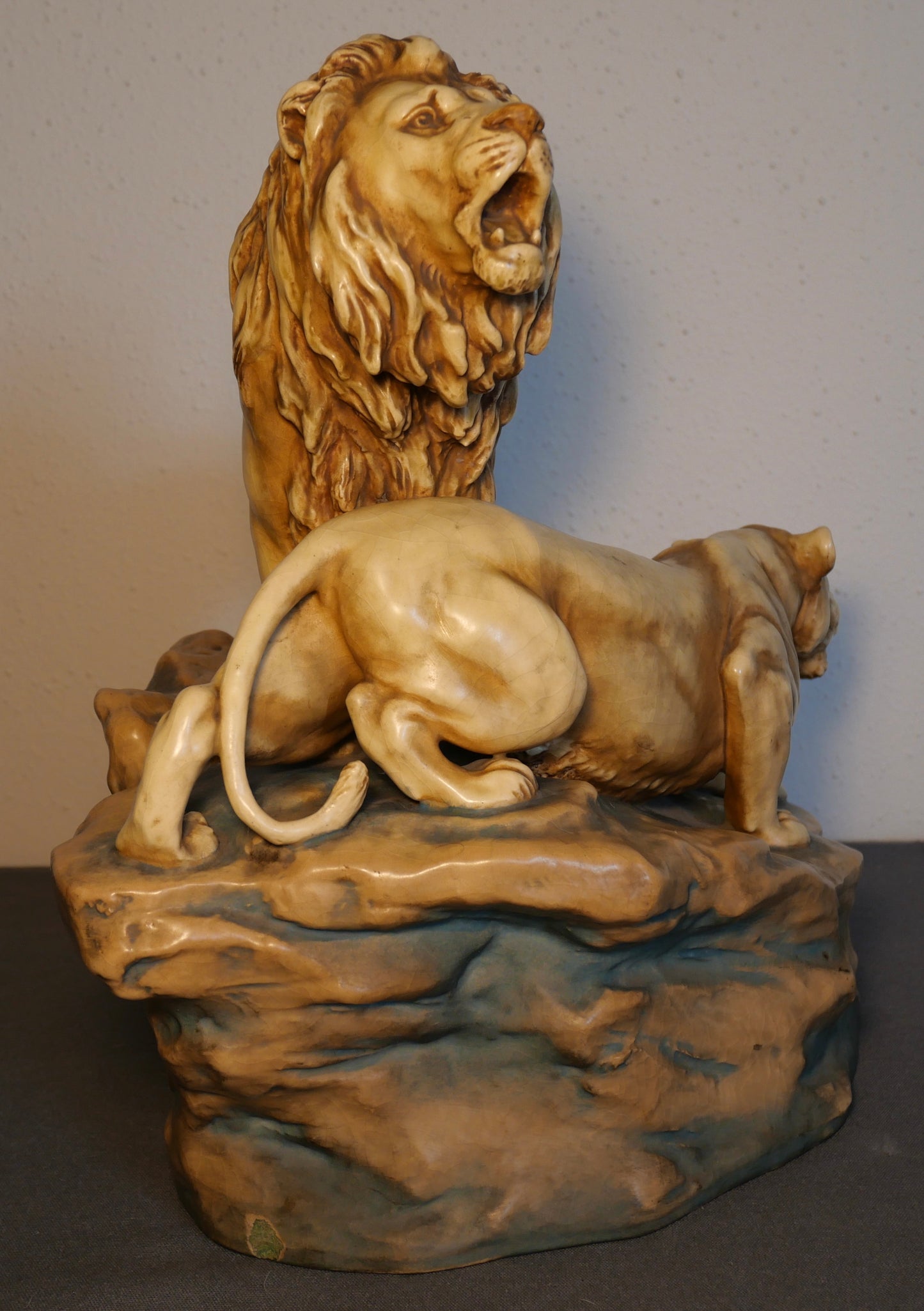 Circa 1900 Austrian Art Nouveau Theodore Schoop for Bernard Bloch Porcelain Lion and Lioness on Rock Figural Group Sculpture