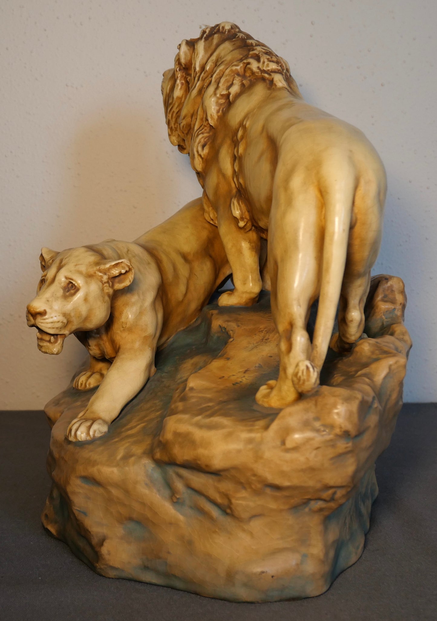 Circa 1900 Austrian Art Nouveau Theodore Schoop for Bernard Bloch Porcelain Lion and Lioness on Rock Figural Group Sculpture