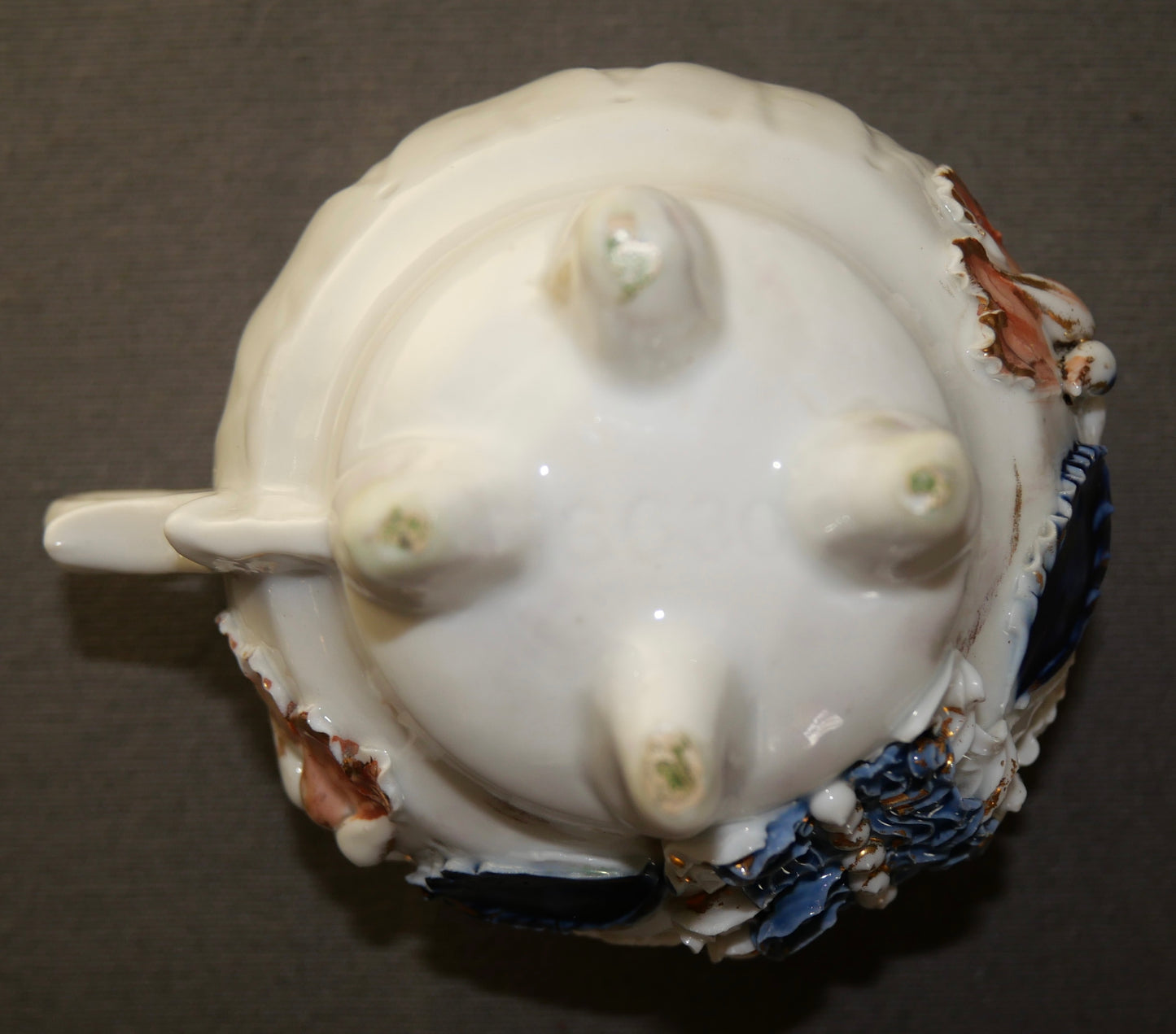 Late 19th Century German Victorian Molded Porcelain Floral Motif Footed Teacup