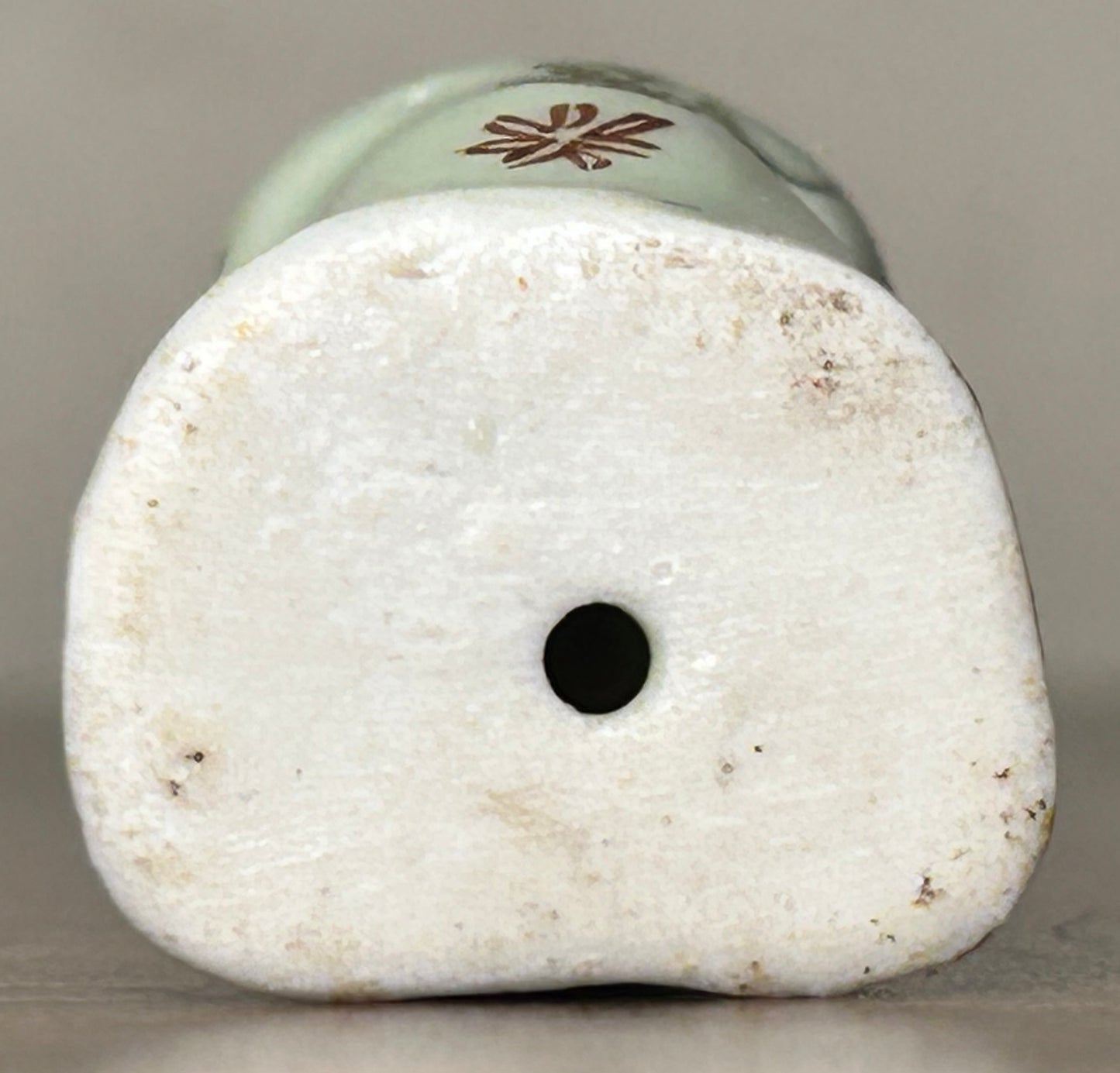Circa Mid 19th Century Japanese Celadon Glazed Porcelain Fukurokuju Miniature Netsuke Figurine