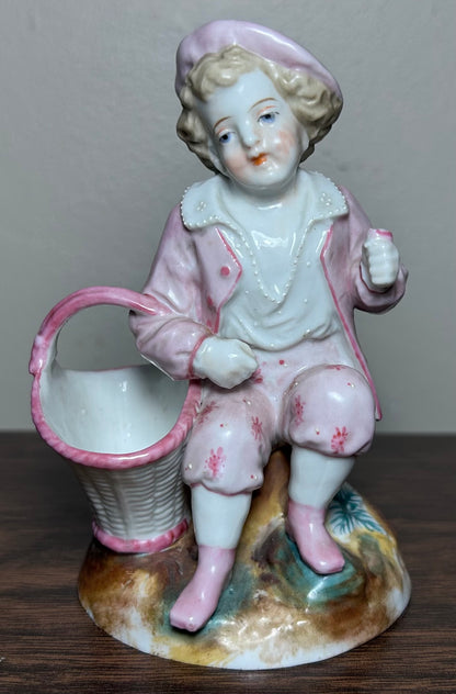 Circa 1870 German Victorian Conta & Boehme Porcelain Young Boy with Flower Basket Figural Matchstick Holder China Fairing