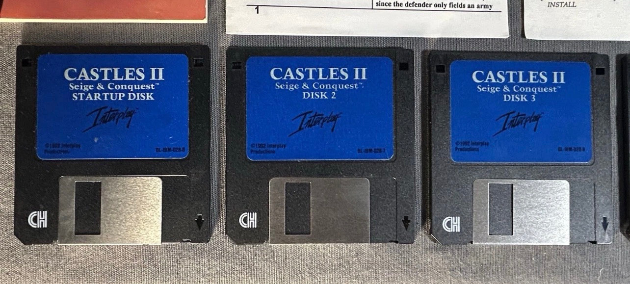 Vintage 1992 Castles II: Siege & Conquest PC Game Complete in Box with 5 Floppy Disks, Instruction Manual, Task Chart, MS-DOS Reference Card, and InterPlay Guide