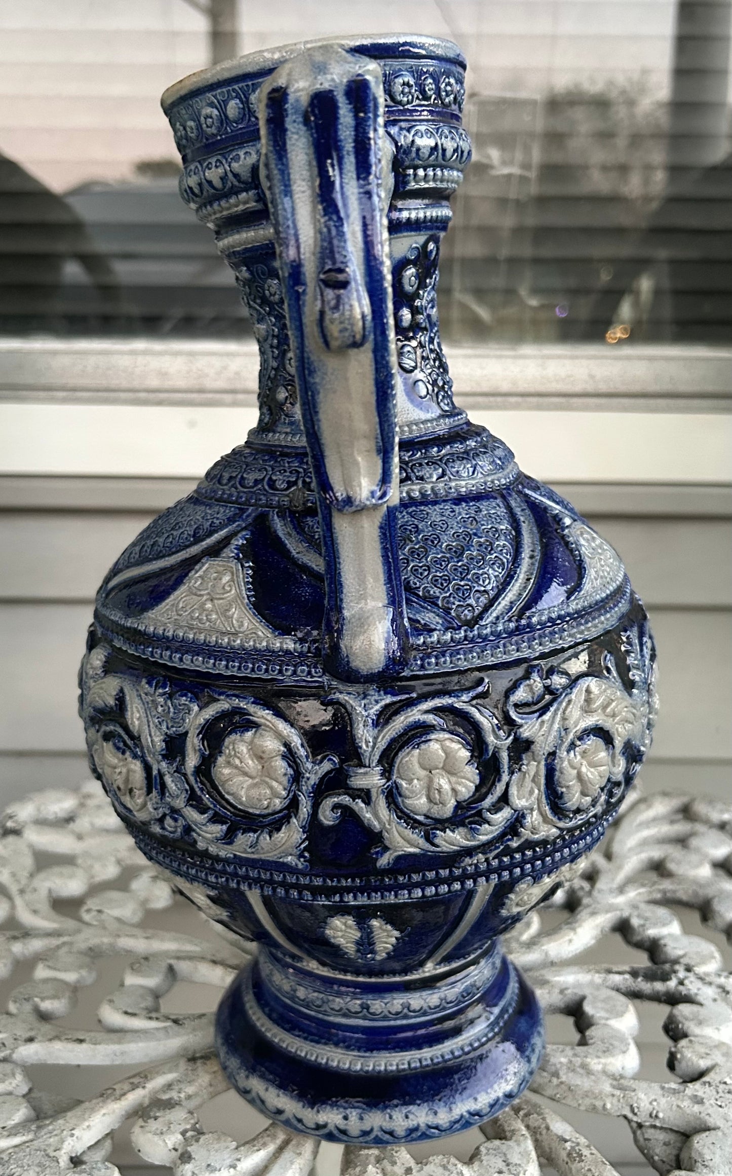 Mid 19th Century German Renaissance Revival Style Westerwald Salt Glazed Stoneware Coat of Arms Motif Satyr Spout Bulbous Footed Ewer