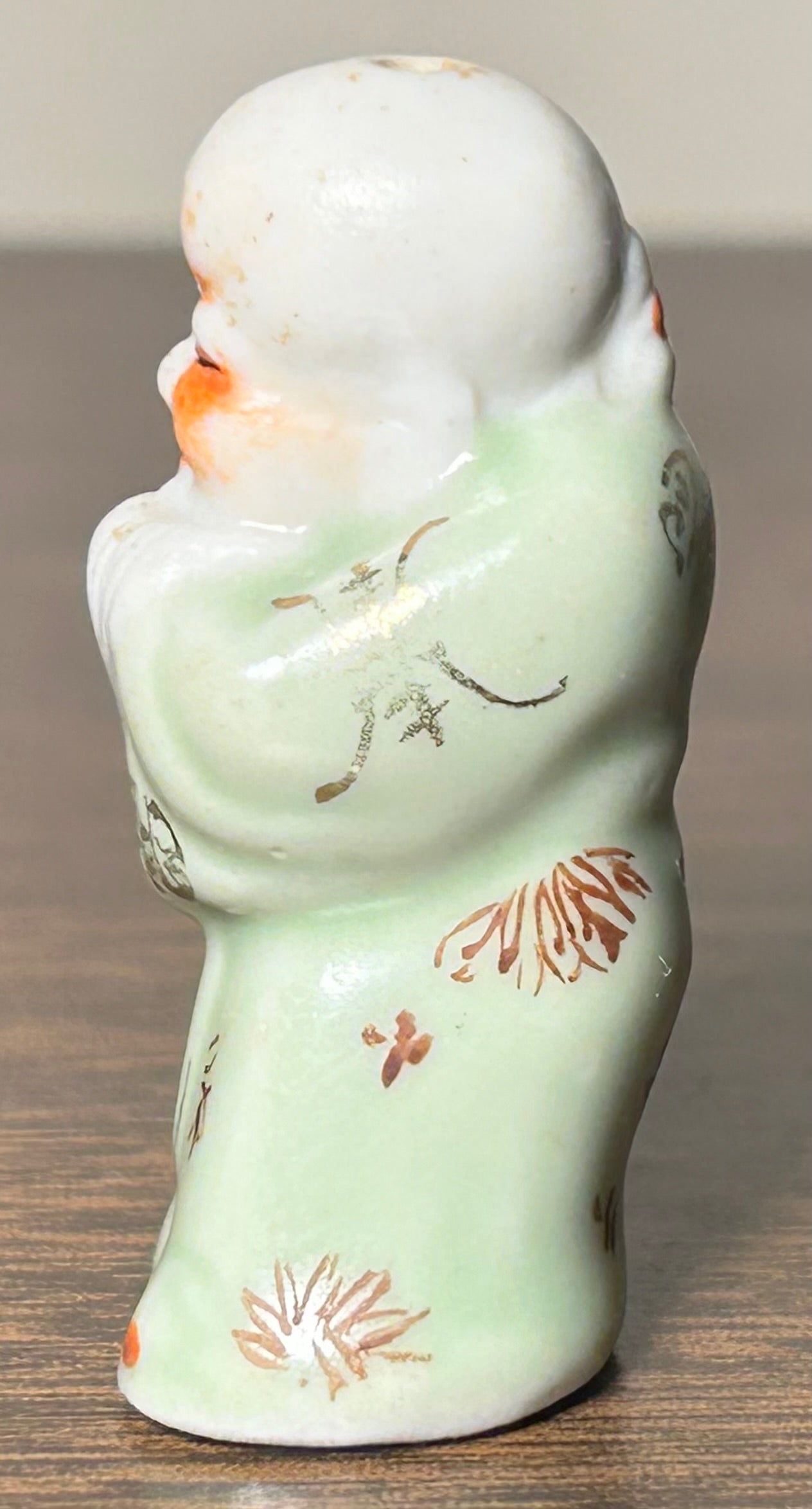 Circa Mid 19th Century Japanese Celadon Glazed Porcelain Fukurokuju Miniature Netsuke Figurine