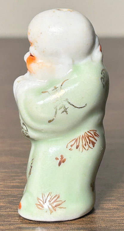 Circa Mid 19th Century Japanese Celadon Glazed Porcelain Fukurokuju Miniature Netsuke Figurine