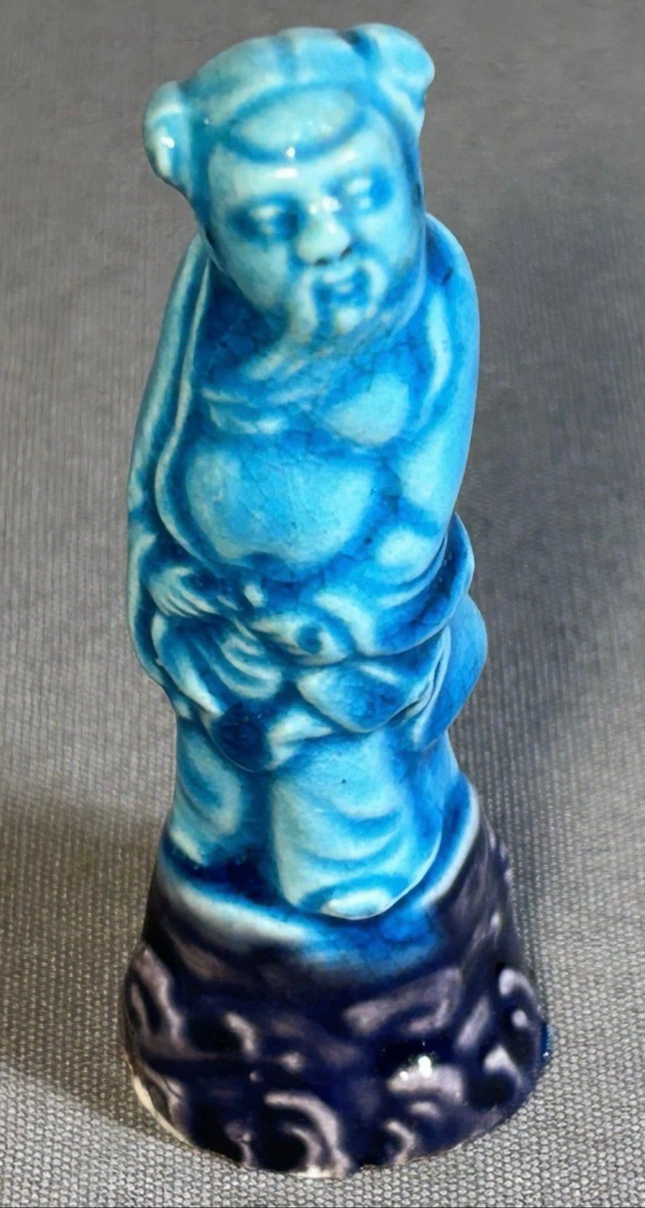 Circa 1920 Chinese Turquoise/Aubergine Glazed Porcelain Taoist Immortal Li Tieguai Figurine (Early Republic Period)