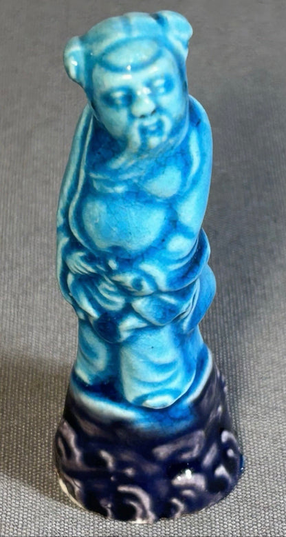 Circa 1920 Chinese Turquoise/Aubergine Glazed Porcelain Taoist Immortal Li Tieguai Figurine (Early Republic Period)