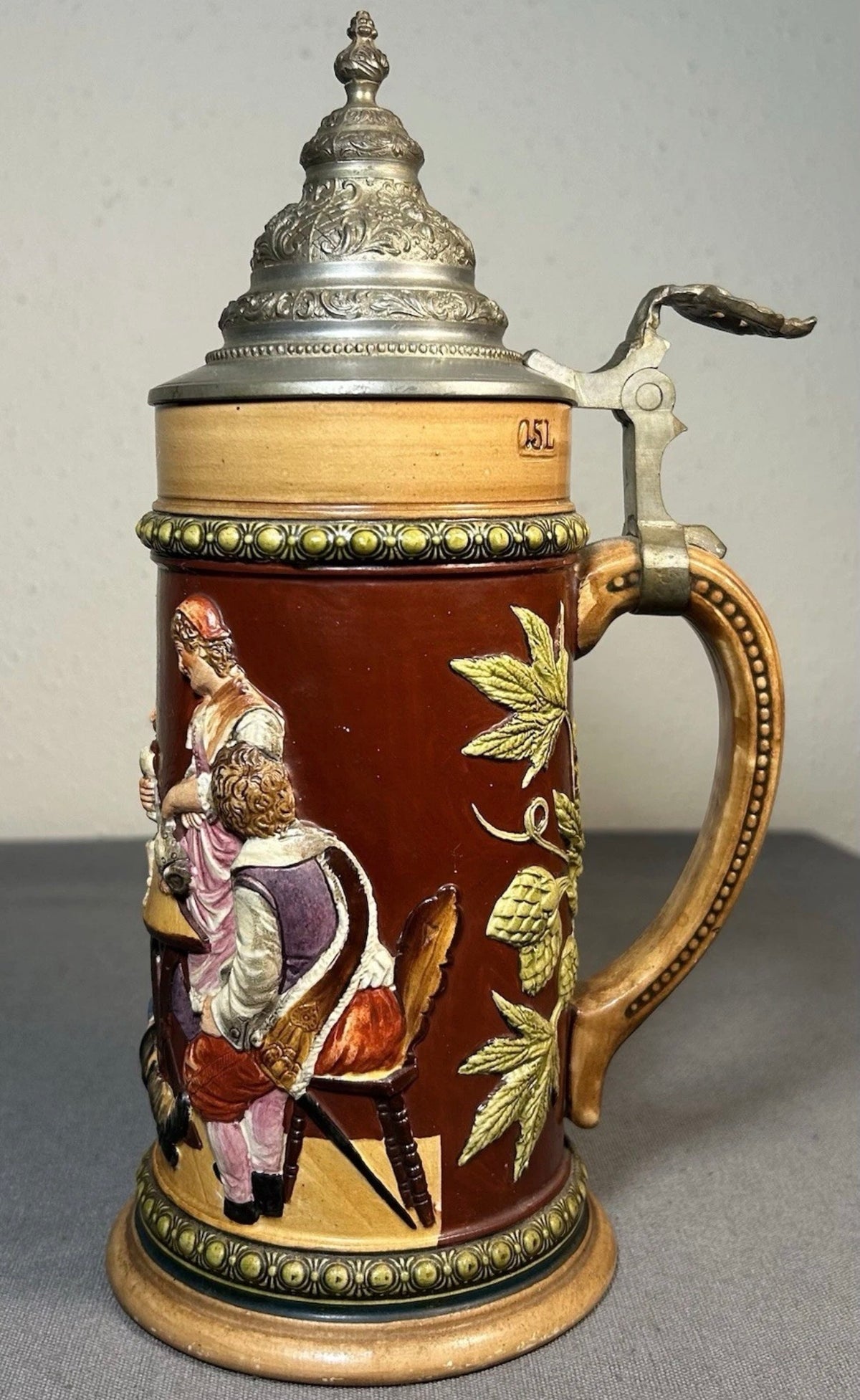Early 20th Century German Westerwald-Style Stoneware High-Relief Tavern Scene Motif Lidded Stein