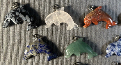 Lot of 11 Carved Polished Natural Gemstone, Crystal, and Art Glass Composite Dolphin Jewelry Pendants