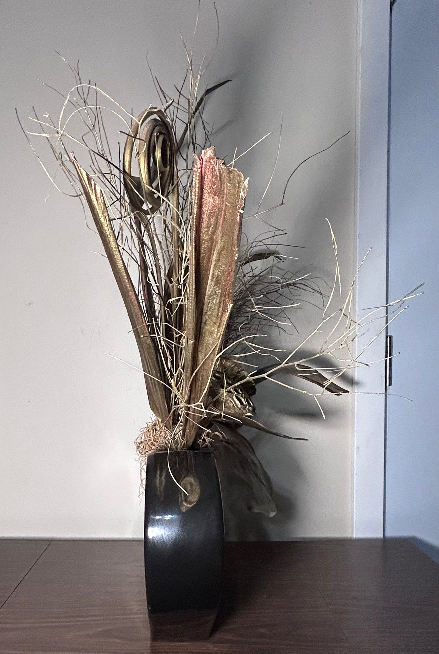 Vintage 1980’s American Post-Modern Gold Painted Dried Floral Arrangement Set in Black Ceramic Freeform Ring Vase