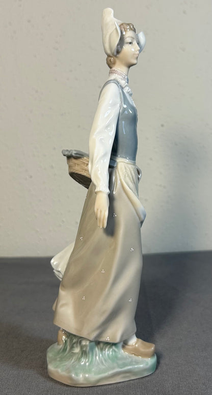 Vintage 1970’s Spanish Lladro Porcelain Genteel Dutch Girl with Flower Basket Figurine (Retired)