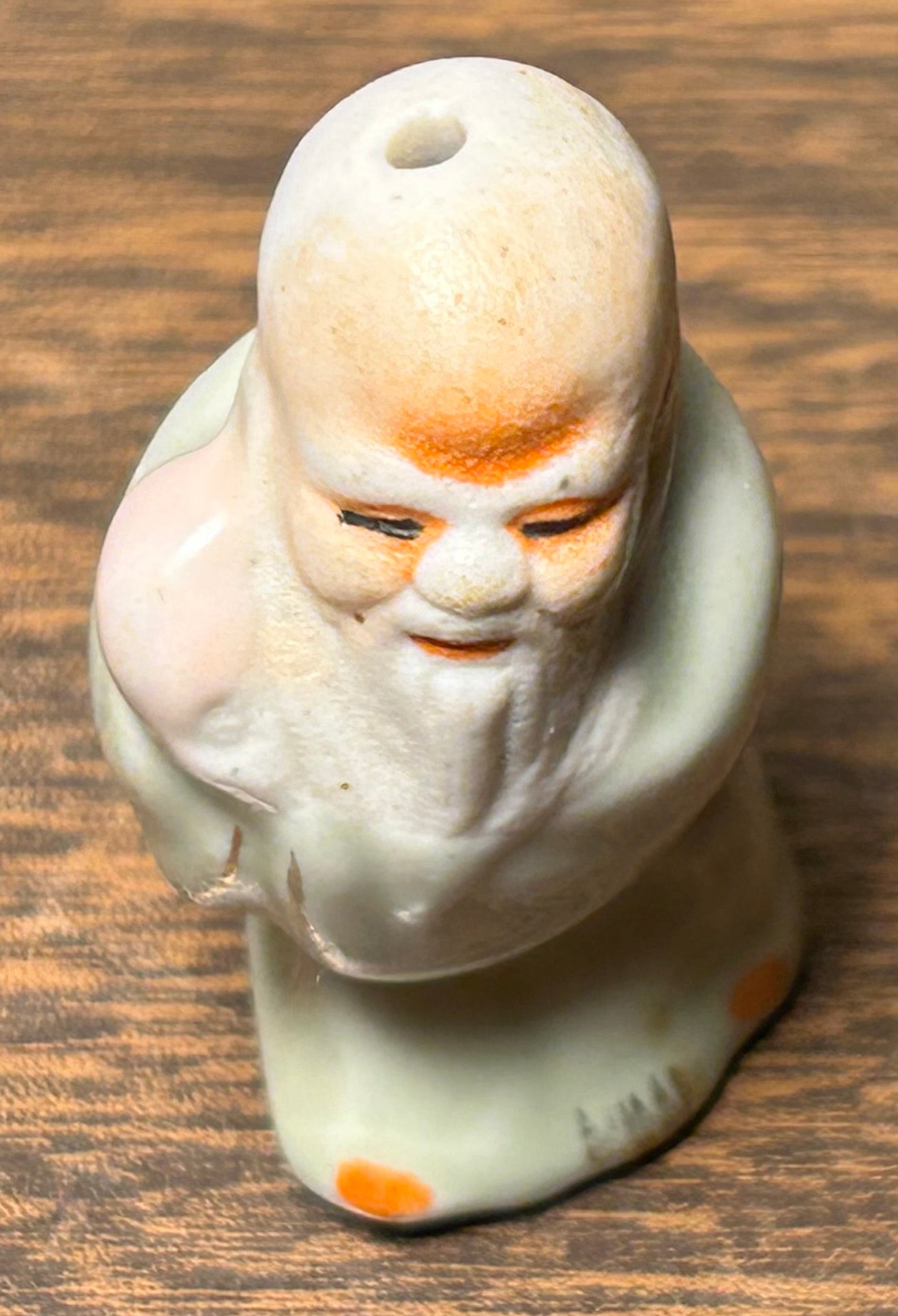 Circa Mid 19th Century Japanese Celadon Glazed Porcelain Fukurokuju Miniature Netsuke Figurine