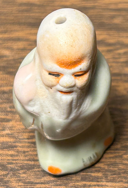 Circa Mid 19th Century Japanese Celadon Glazed Porcelain Fukurokuju Miniature Netsuke Figurine