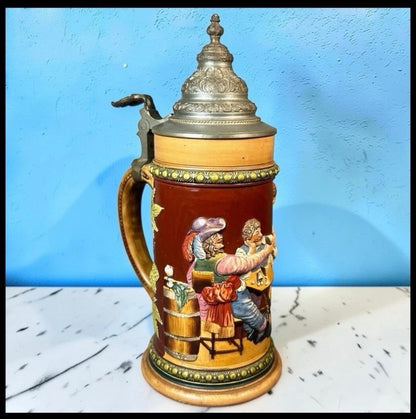 Early 20th Century German Westerwald-Style Stoneware High-Relief Tavern Scene Motif Lidded Stein