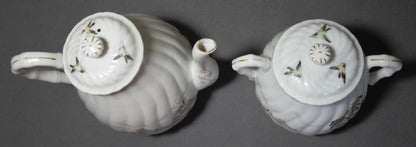 Circa 1920 Japanese Kutani Porcelain Hand Painted Village Motifs Bamboo Handled Teapot and Lidded Sugar Bowl Set (Taisho Period)
