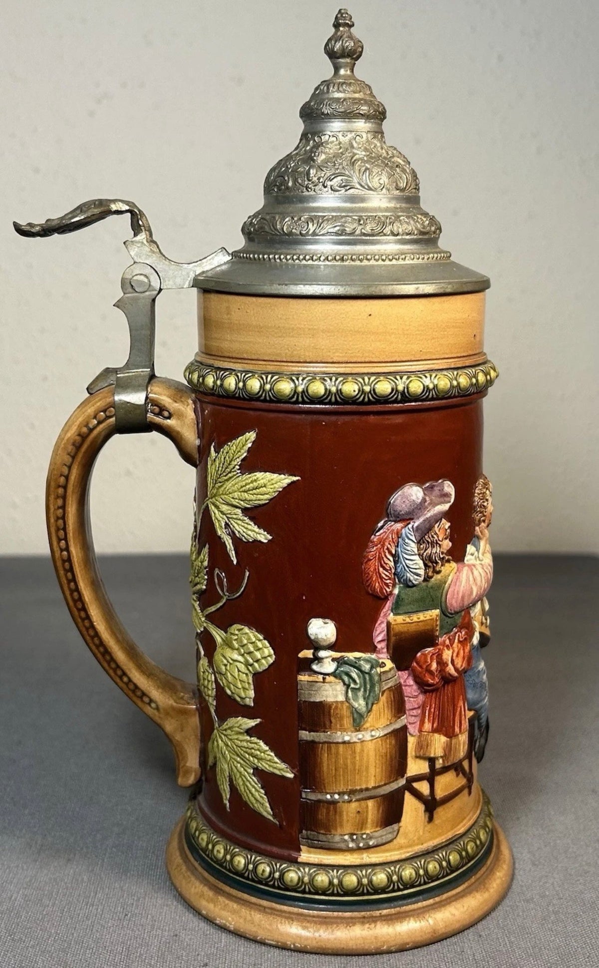 Early 20th Century German Westerwald-Style Stoneware High-Relief Tavern Scene Motif Lidded Stein