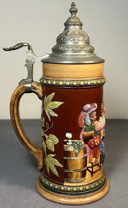 Early 20th Century German Westerwald-Style Stoneware High-Relief Tavern Scene Motif Lidded Stein