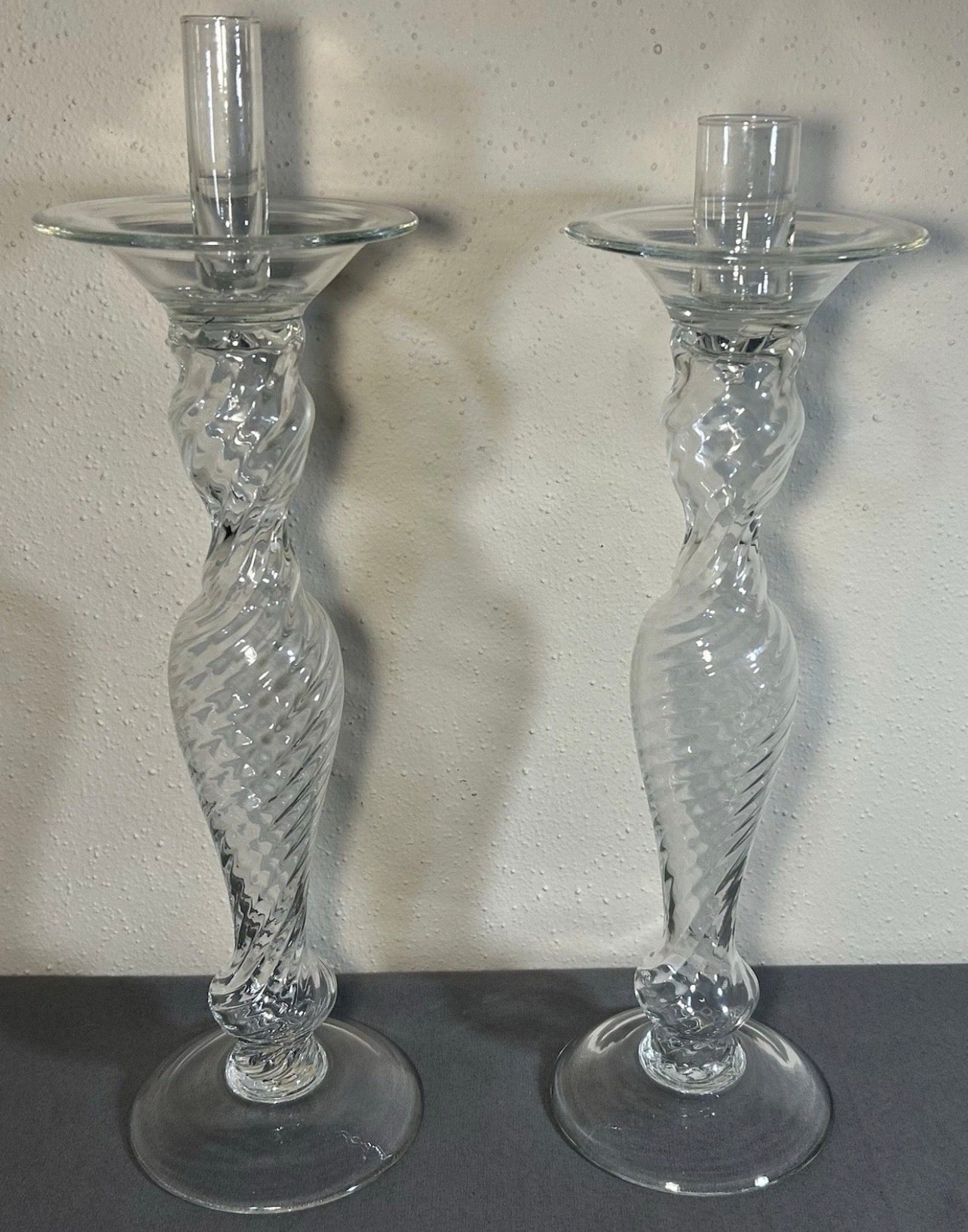 Pair of Vintage 1960’s Italian Empoli Monumental Mid Century Modern Clear Art Glass Optic Swirl Torsade Pattern Staggered Integrated Candle-Socket Chimney Circular Bobeche Drip Pans Candlesticks