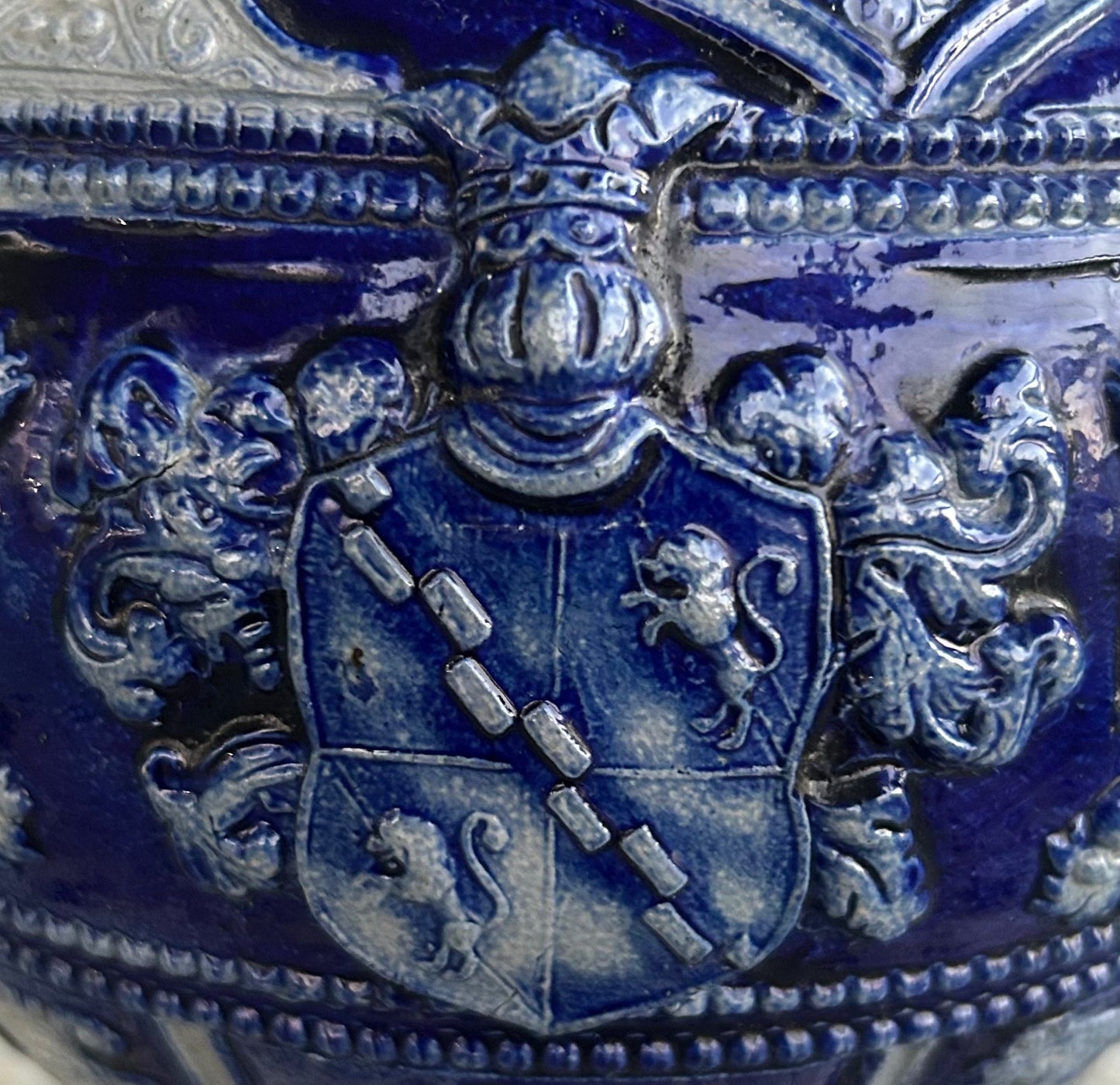 Mid 19th Century German Renaissance Revival Style Westerwald Salt Glazed Stoneware Coat of Arms Motif Satyr Spout Bulbous Footed Ewer