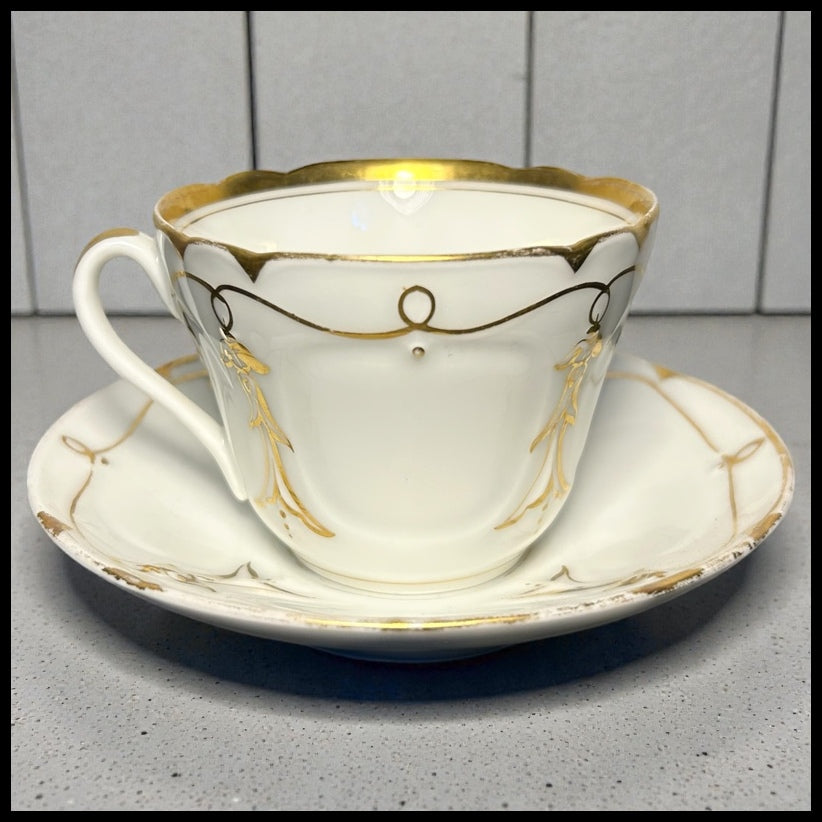 Late 19th Century French Rococo Revival T. REES. Old Paris Porcelain Gilded Floral/Vine Motifs Teacup and Saucer Set