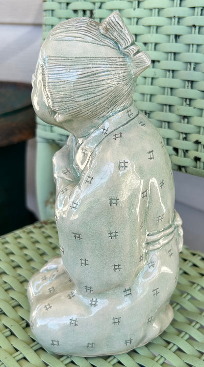Vintage Mid 20th Century Japanese Young Boy Kneeling Carved Crackle Glazed Celadon Ceramic Sculptural Figure (Showa Period)