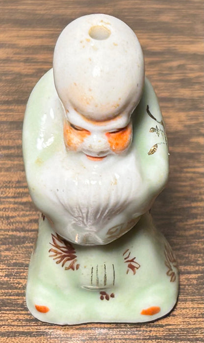 Circa Mid 19th Century Japanese Celadon Glazed Porcelain Fukurokuju Miniature Netsuke Figurine