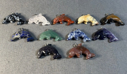 Lot of 11 Carved Polished Natural Gemstone, Crystal, and Art Glass Composite Dolphin Jewelry Pendants
