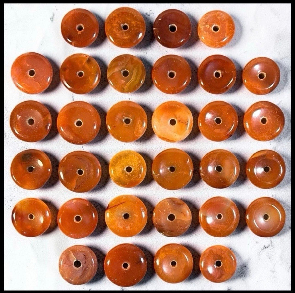 Lot of 32 Carved Polished Natural Red Agate and Carnelian Gemstone Donut Jewelry Pendants