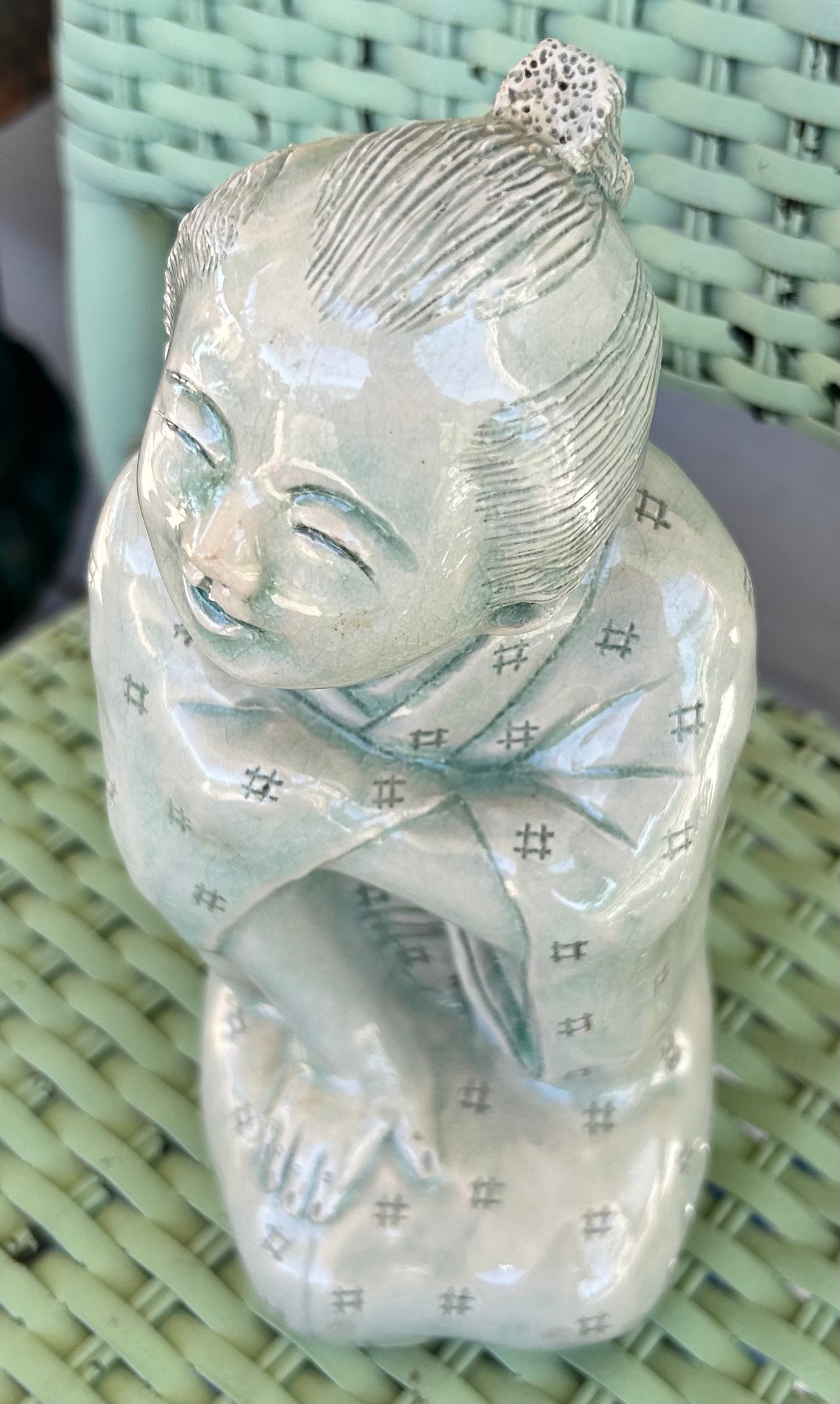 Vintage Mid 20th Century Japanese Young Boy Kneeling Carved Crackle Glazed Celadon Ceramic Sculptural Figure (Showa Period)