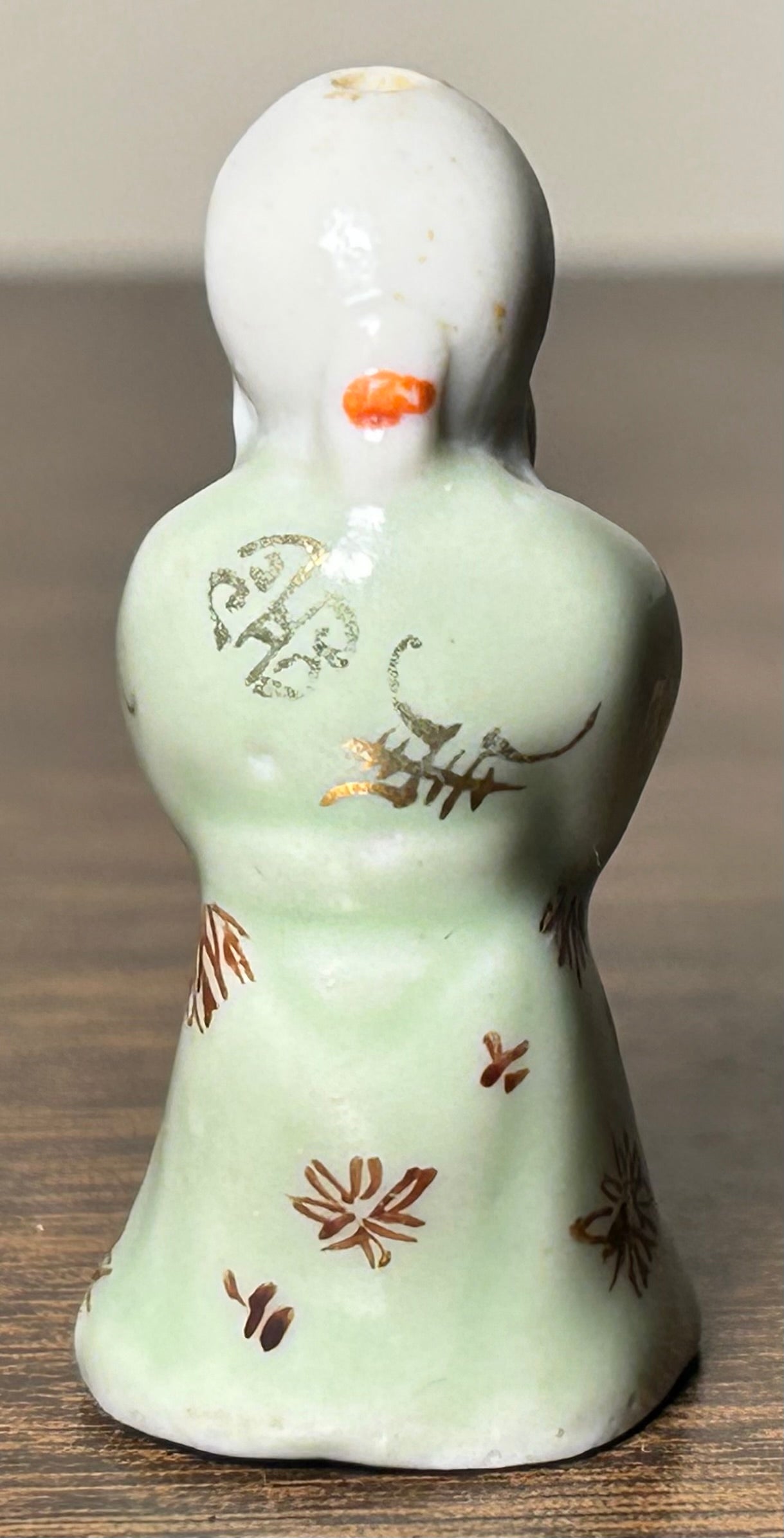Circa Mid 19th Century Japanese Celadon Glazed Porcelain Fukurokuju Miniature Netsuke Figurine
