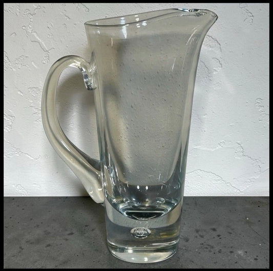 Vintage 1960’s Swedish Mid Century Modern Kosta Clear Art Glass Pippi Series Tall Pitcher with Controlled Bubble Weighted Base by Vicke Lindstrand (LH 1740)