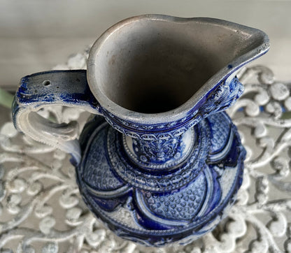 Mid 19th Century German Renaissance Revival Style Westerwald Salt Glazed Stoneware Coat of Arms Motif Satyr Spout Bulbous Footed Ewer