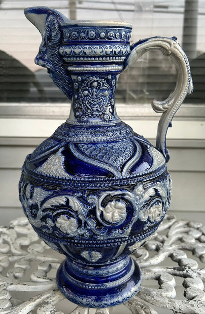 Mid 19th Century German Renaissance Revival Style Westerwald Salt Glazed Stoneware Coat of Arms Motif Satyr Spout Bulbous Footed Ewer