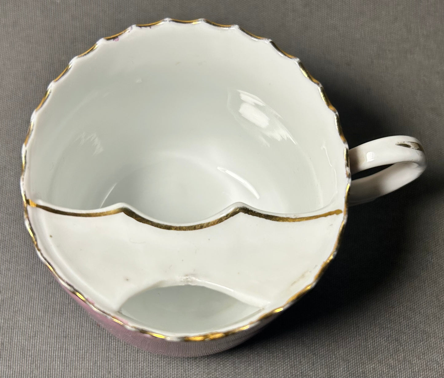 Late 19th Century German Victorian Schlesische Porzellanfabrik Louis Lövinsohn and P. Donath Gilded Pink Porcelain Mustache Cup and Saucer Set