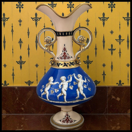 Mid 19th Century French Rococo Revival Porcelain Hand-Painted Gilded Bacchanal Putti Holding Vine Motif Double-Handled Footed Baluster Vase