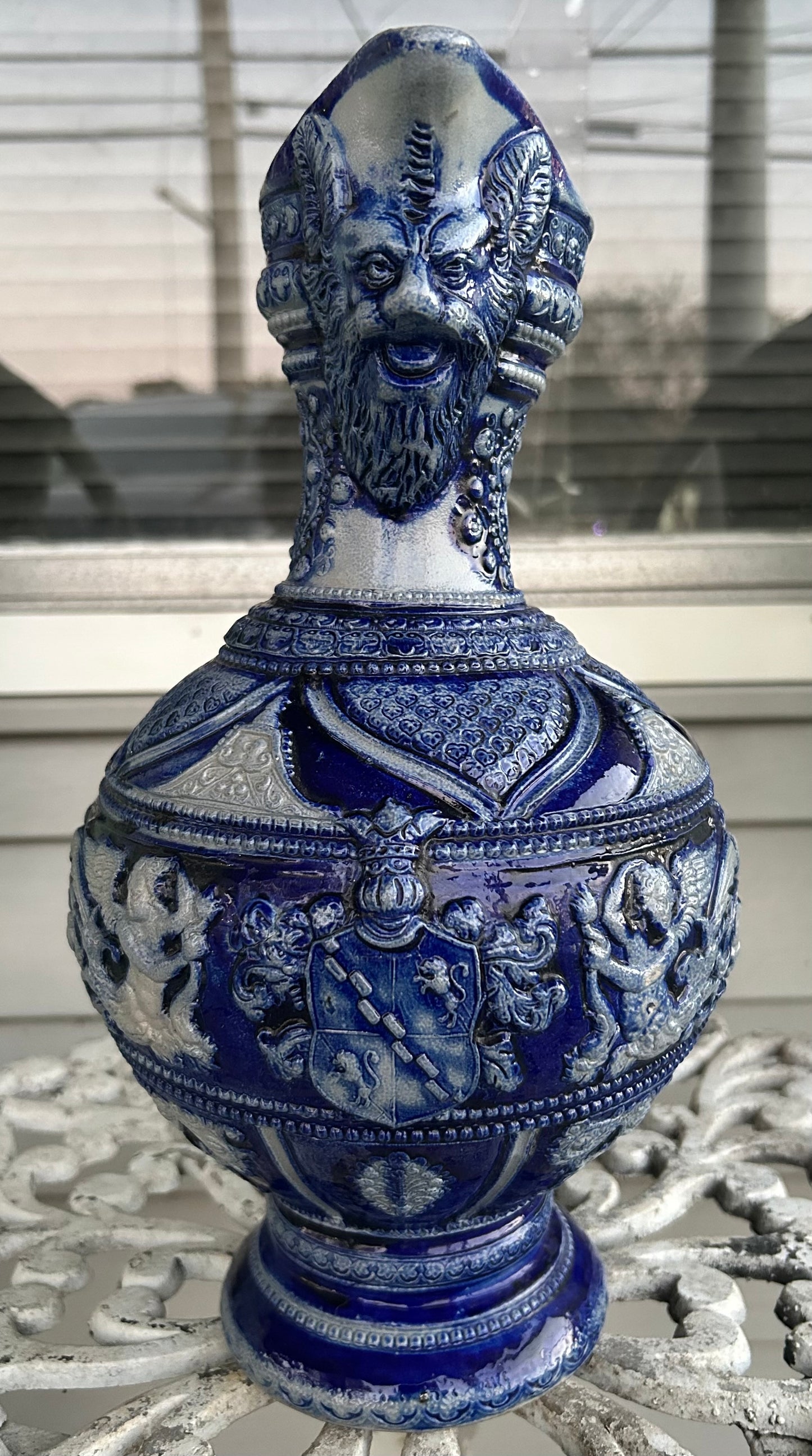 Mid 19th Century German Renaissance Revival Style Westerwald Salt Glazed Stoneware Coat of Arms Motif Satyr Spout Bulbous Footed Ewer