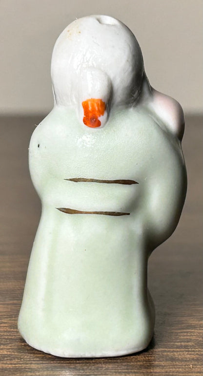 Circa Mid 19th Century Japanese Celadon Glazed Porcelain Fukurokuju Miniature Netsuke Figurine