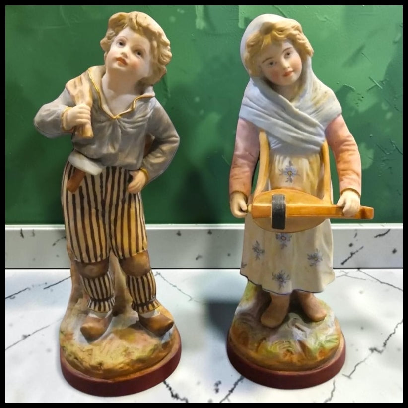 Pair of Late 19th Century French Victorian Mauger ets Fils Bisque Young Boy and Girl Figurines