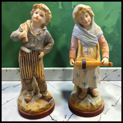 Pair of Late 19th Century French Victorian Mauger ets Fils Bisque Young Boy and Girl Figurines
