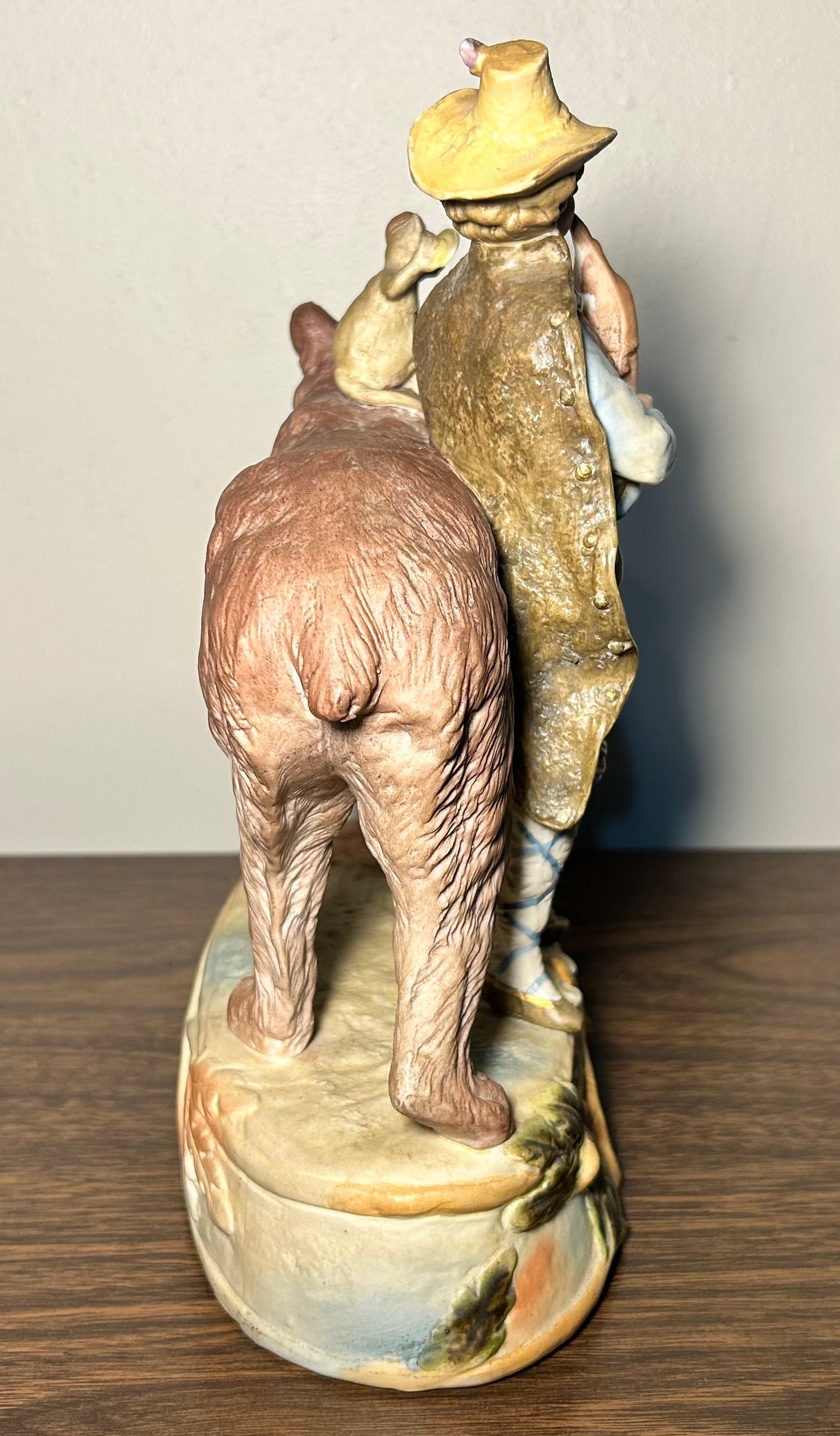 Circa 1930 German Scheibe-Alsbach Kister Bisque Porcelain Man with Bagpipes/Monkey with Cymbals Atop Grizzly Bear Figural Group