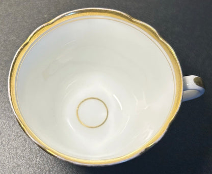 Late 19th Century French Rococo Revival T. REES. Porcelain Gilded Floral/Vine Motifs Teacup and Saucer Set