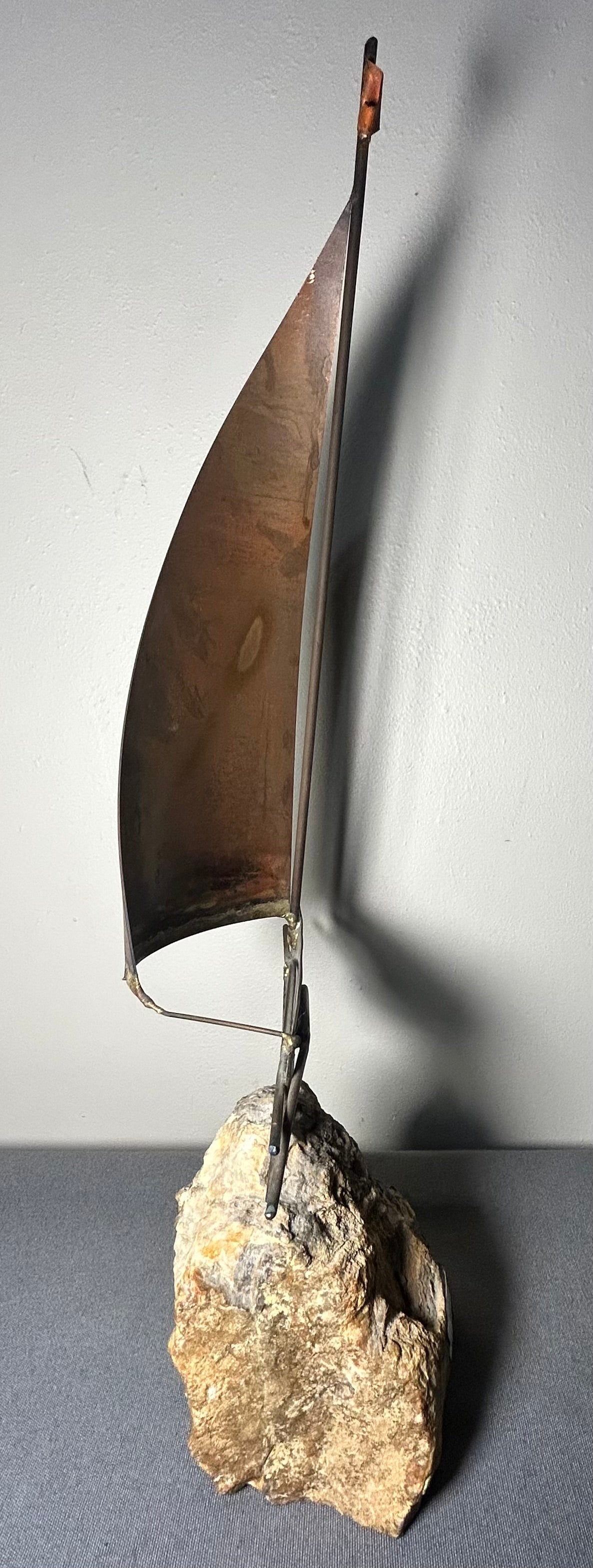 Vintage 1970’s American Brutalist Welded Copper/Brass Metal Sailboat on Stone Base Sculpture by Bijan Bahar