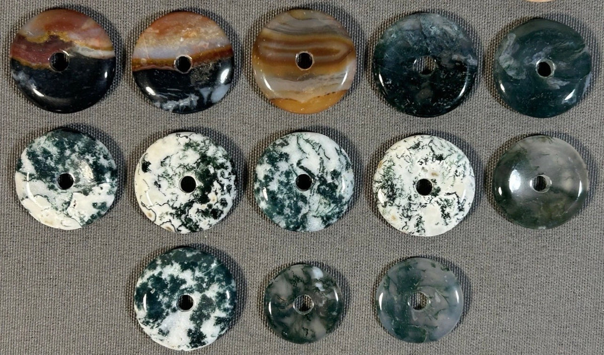 Lot of 22 Natural Carved Polished Carnelian, Banded Agate, Tree Agate, Moss Agate, and Quartz Donut Jewelry Pendants
