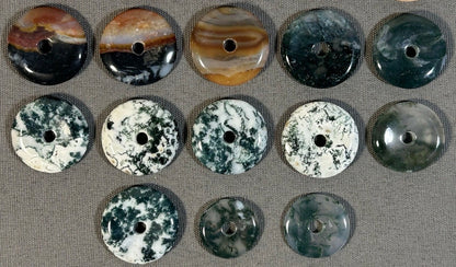 Lot of 22 Natural Carved Polished Carnelian, Banded Agate, Tree Agate, Moss Agate, and Quartz Donut Jewelry Pendants