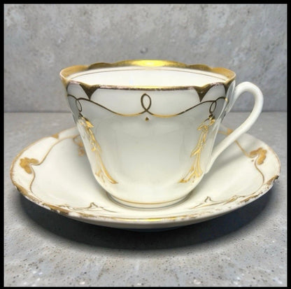Late 19th Century French Rococo Revival T. REES. Porcelain Gilded Floral/Vine Motifs Teacup and Saucer Set