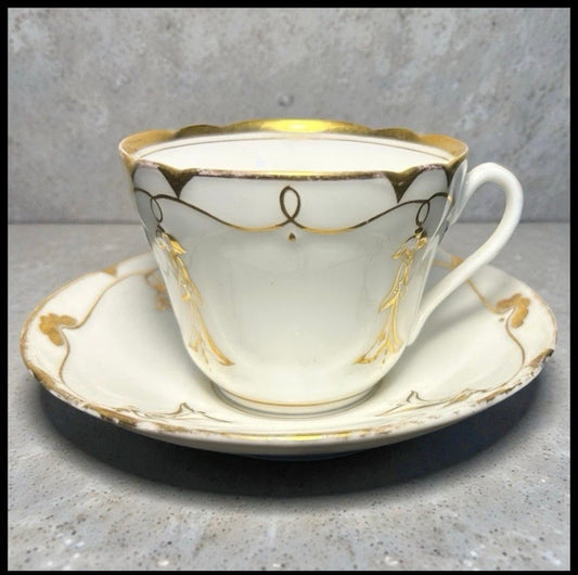 Late 19th Century French Rococo Revival T. REES. Porcelain Gilded Floral/Vine Motifs Teacup and Saucer Set