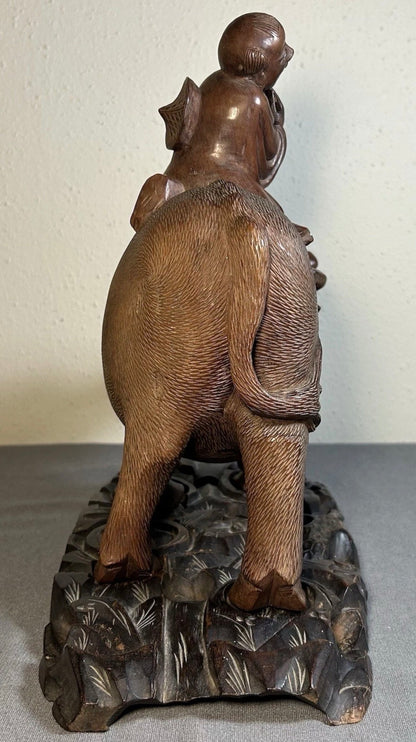 1920’s Chinese Young Herdsboy Riding Water Buffalo on Openwork Base Hand-Carved Rosewood Sculpture