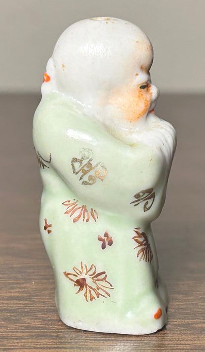 Circa Mid 19th Century Japanese Celadon Glazed Porcelain Fukurokuju Miniature Netsuke Figurine